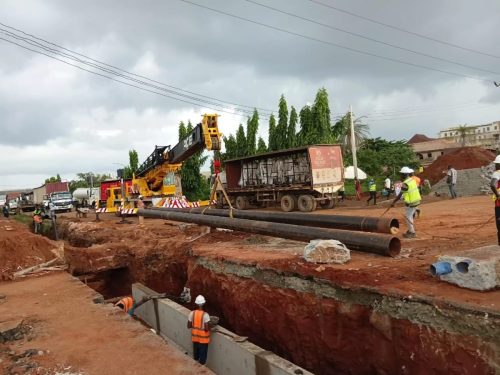 Blinding of excavated trench to received concrete U channel drain
